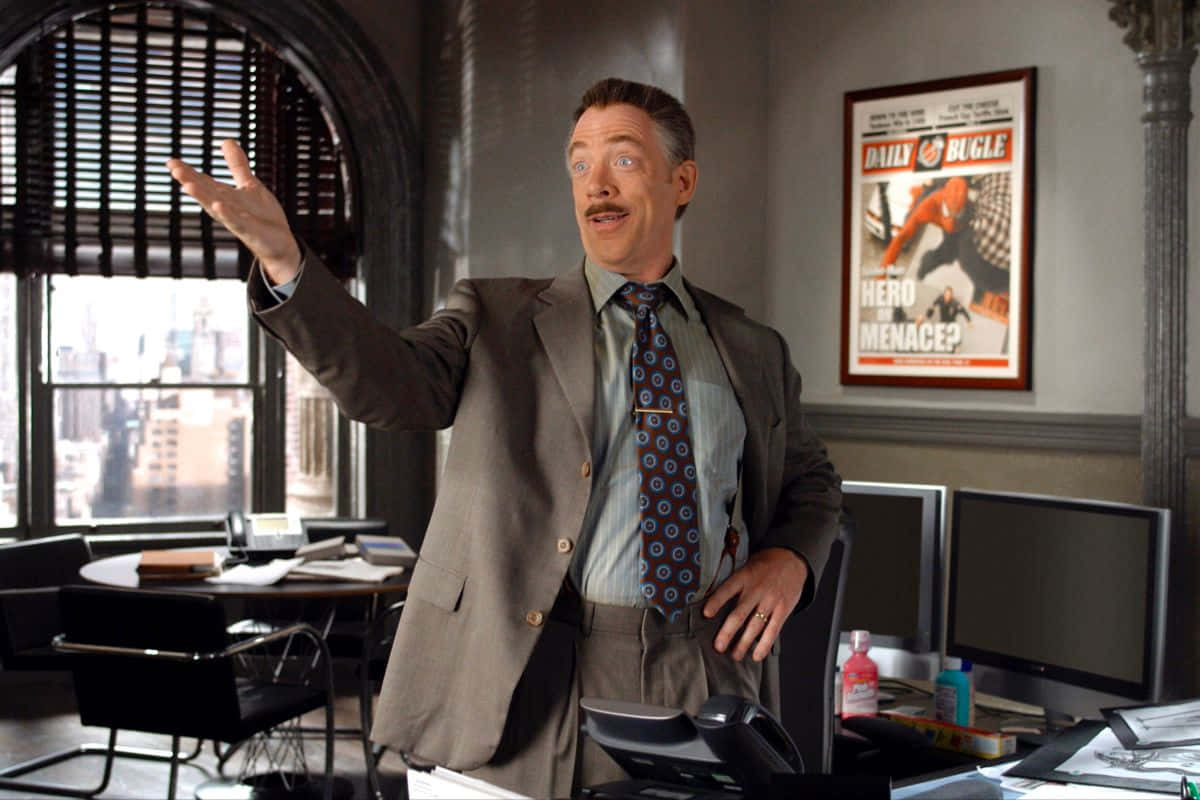 J. Jonah Jameson revealing the Daily Bugle front page Wallpaper