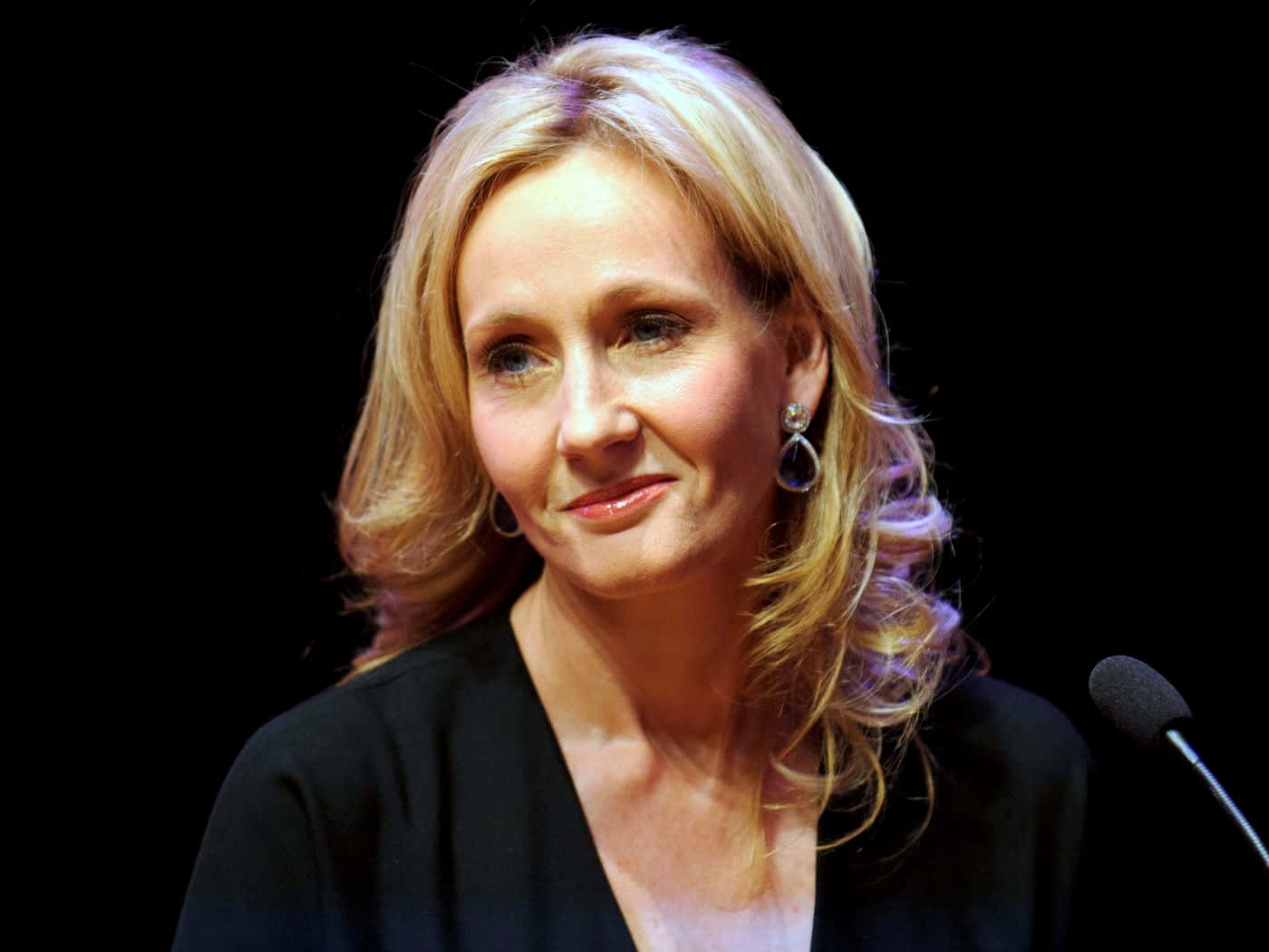 J.K. Rowling at a book signing event Wallpaper