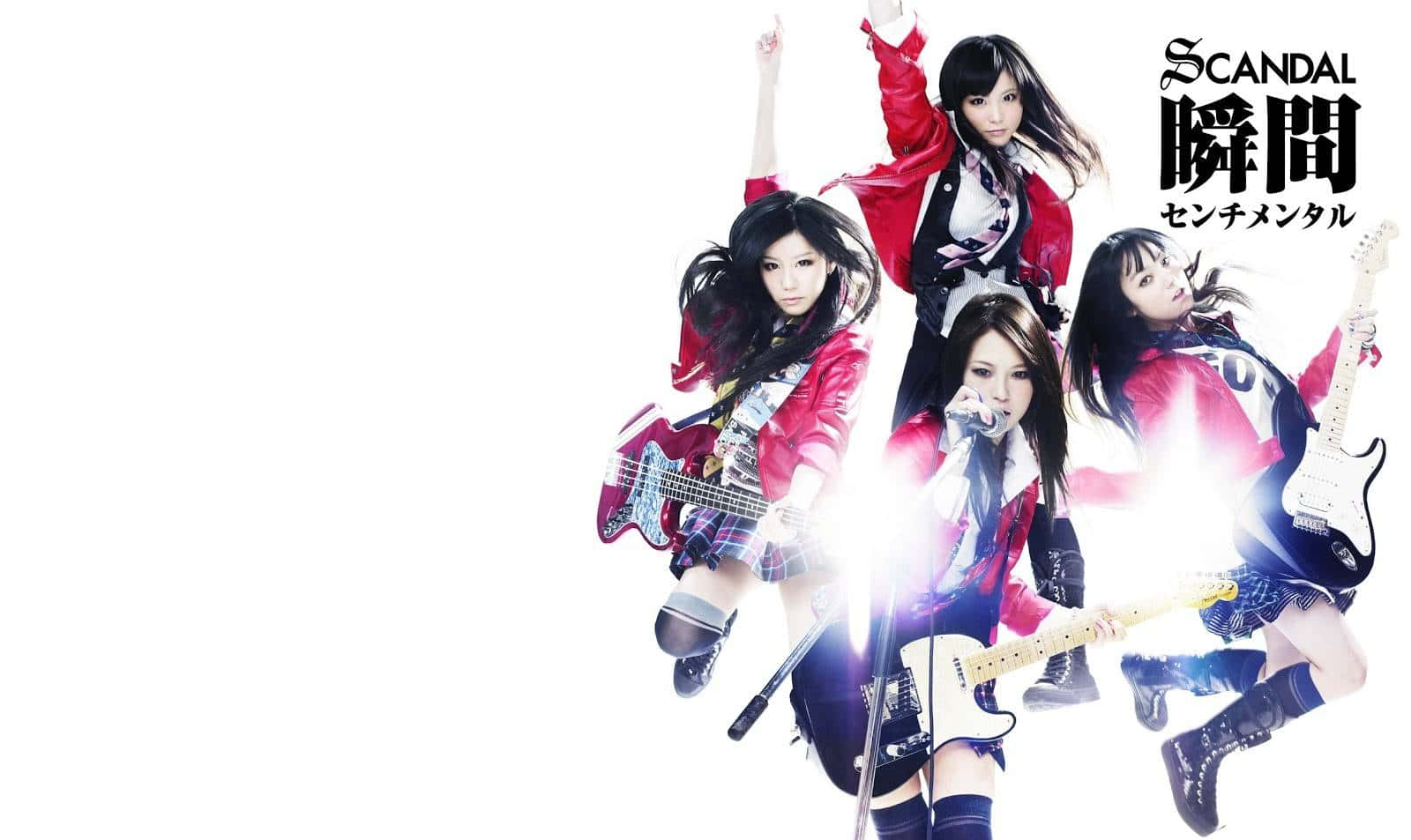 Energetic J-pop Music Band Performing Onstage Wallpaper