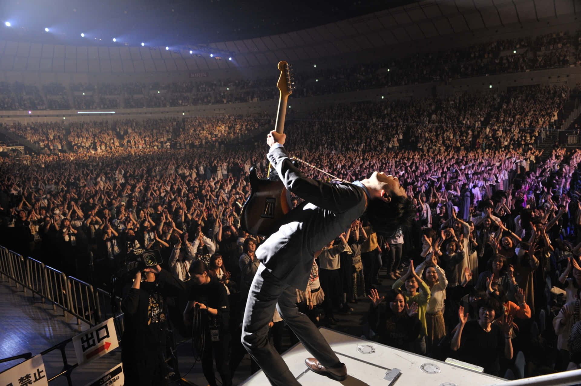 J-Rock band members performing live onstage Wallpaper