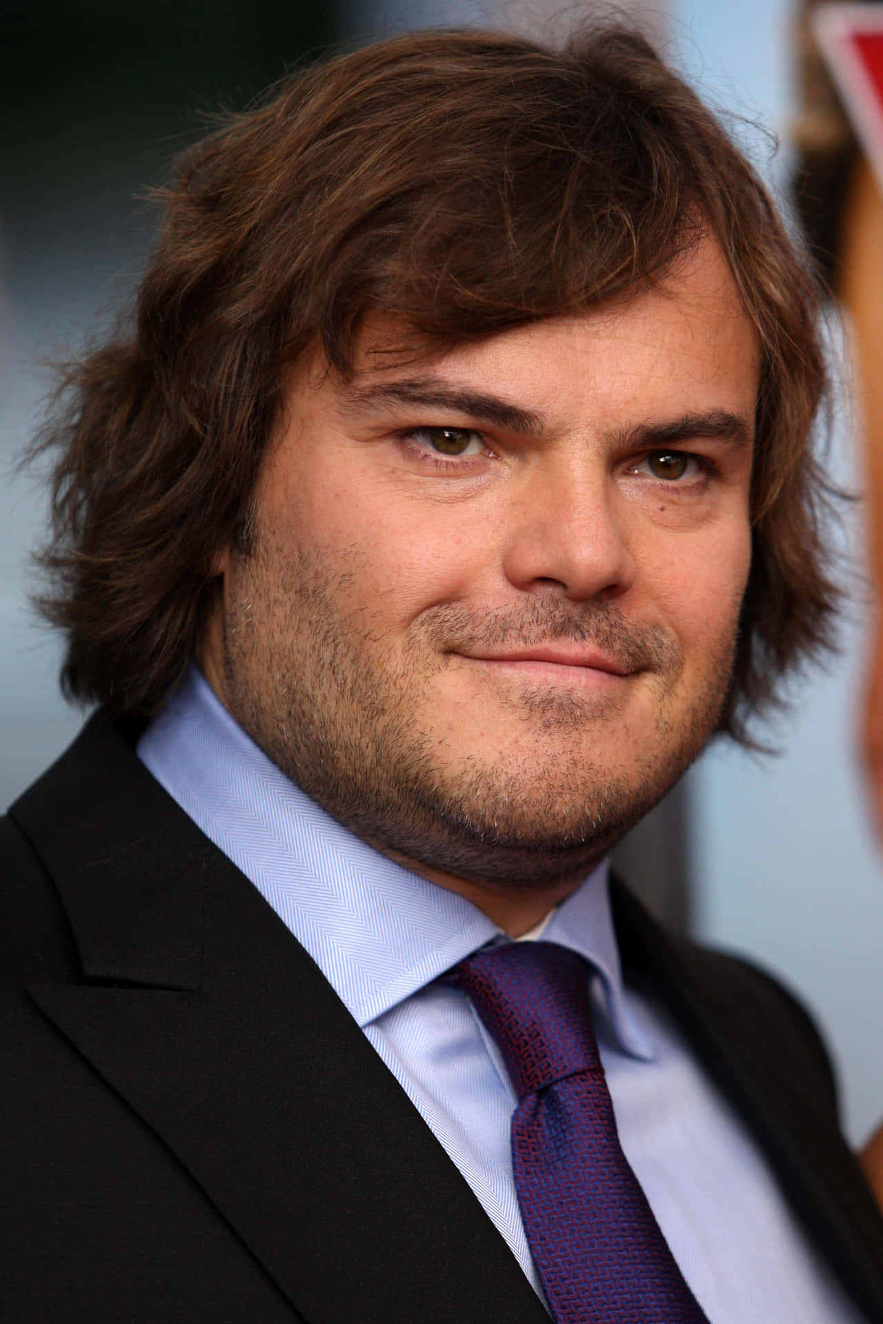 Download Actor And Comedian Jack Black Wearing A Backwards Baseball Cap