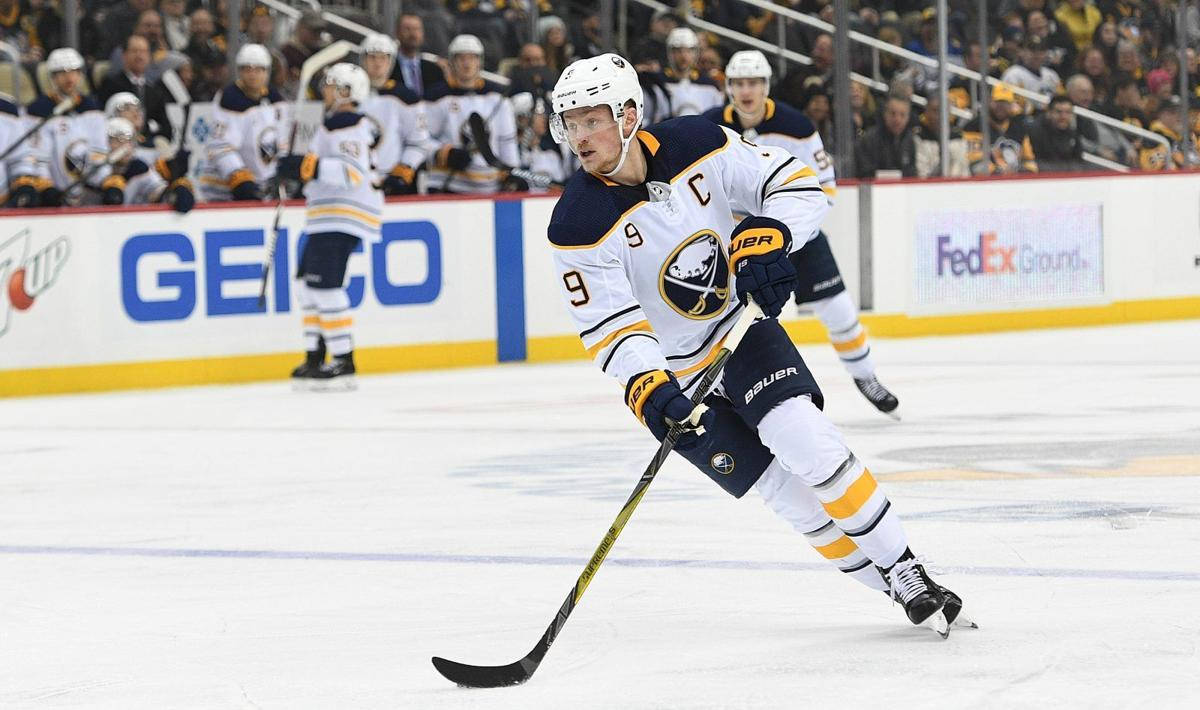 Buffalo Sabres' star player Jack Eichel in action Wallpaper