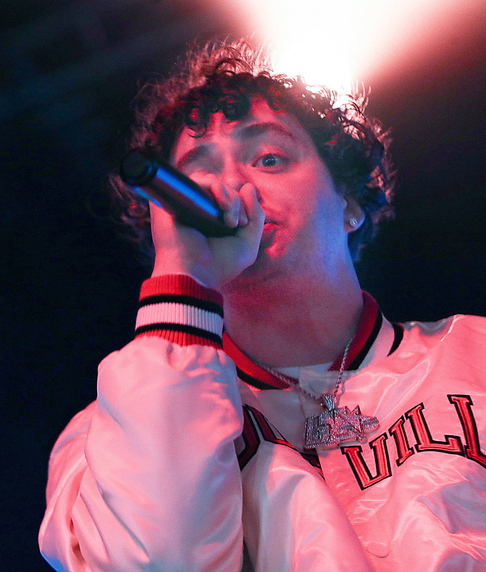 Jack Harlow Holding Microphone Background