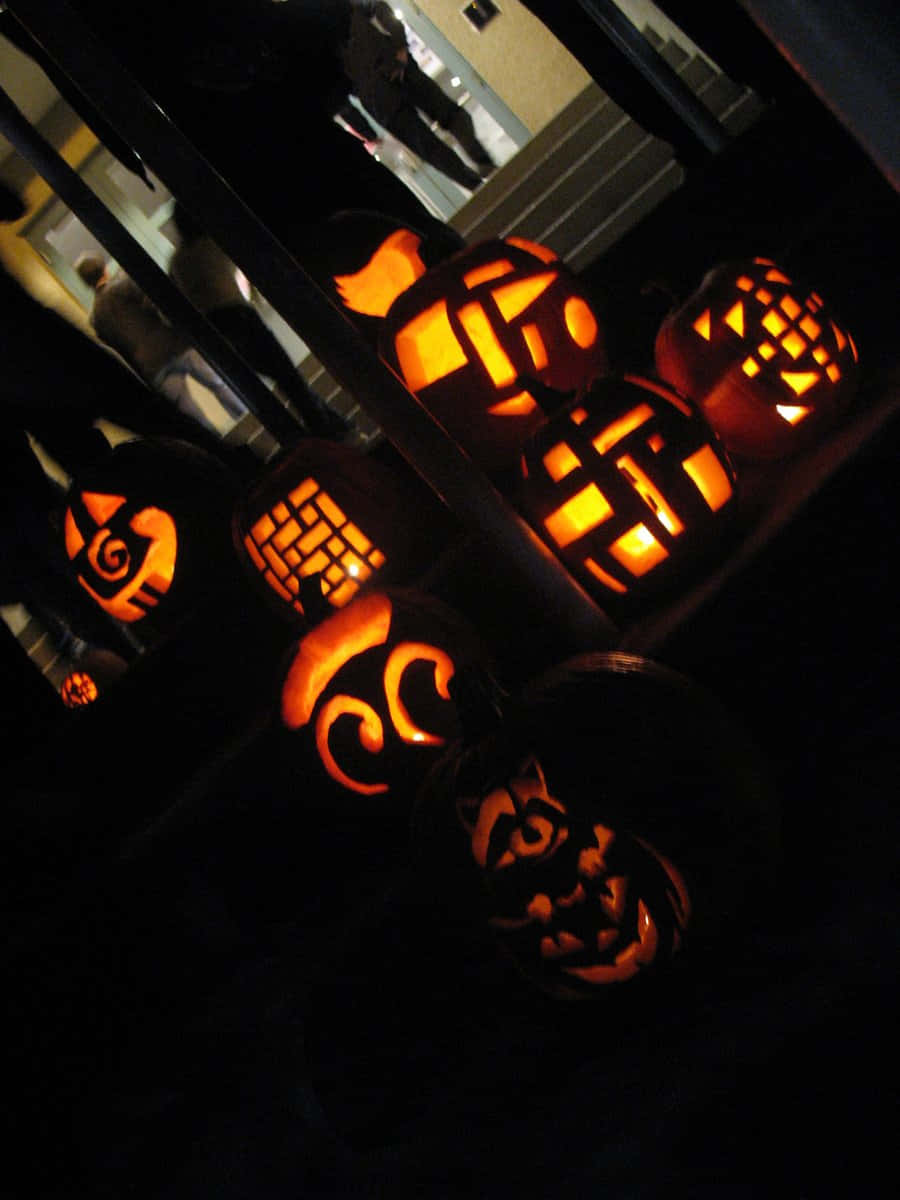Colorful Jack O' Lanterns Illuminate A Fall Festival