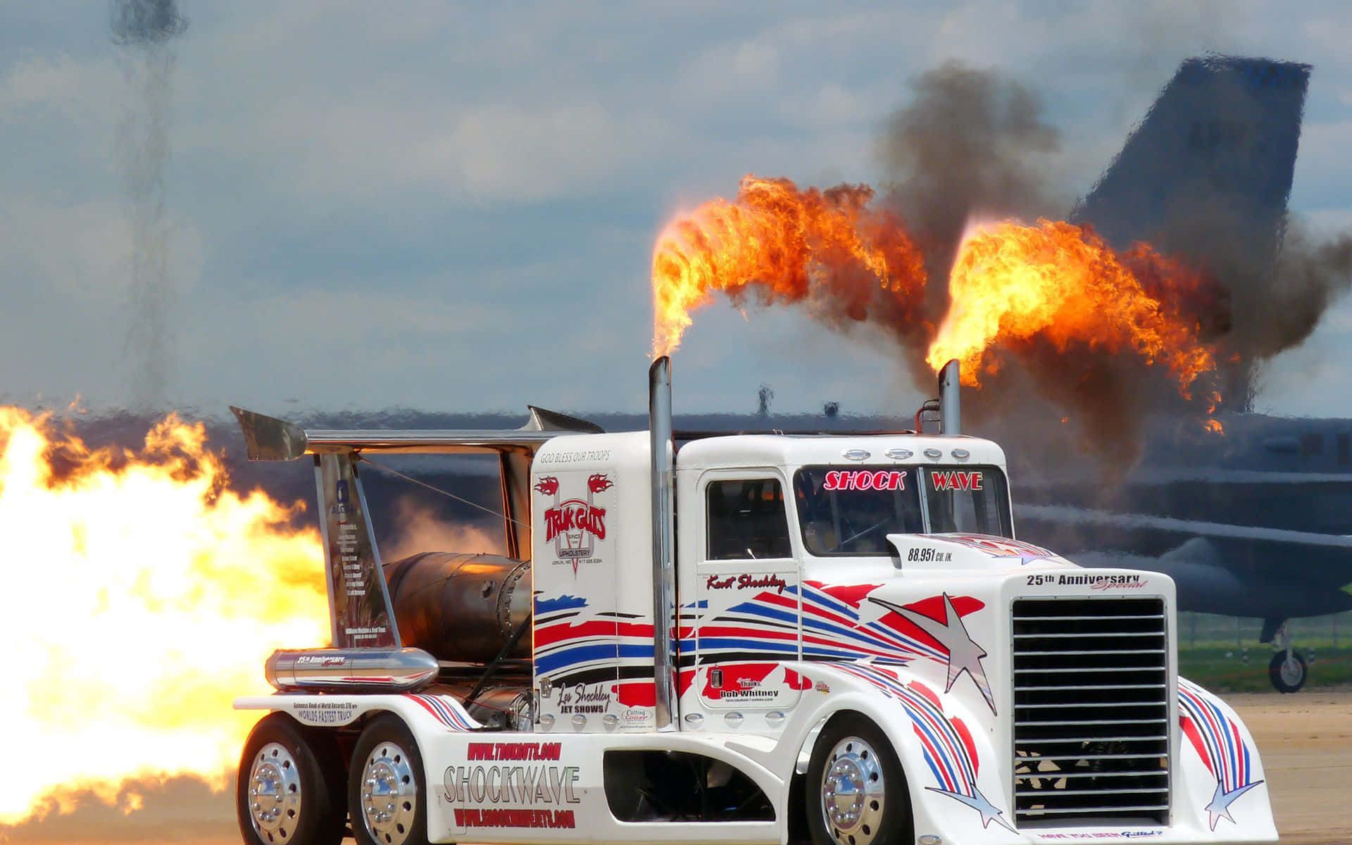 A White Truck With Flames Wallpaper