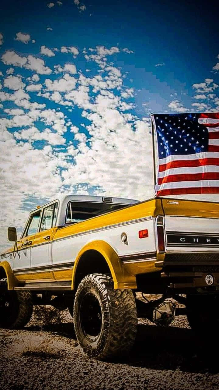 Yellow Jacked Up Trucks With White Stripe Wallpaper