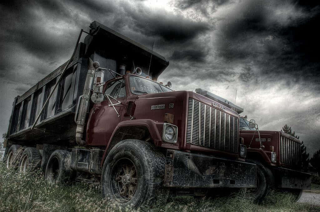 Jacked Up Trucks On Cloudy Day Wallpaper