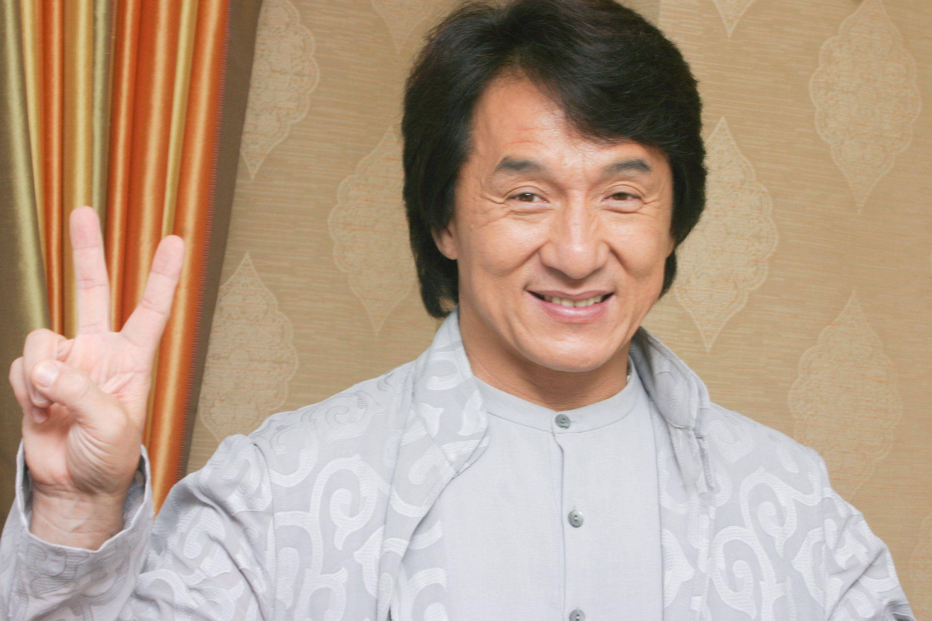 Jackie Chan Peace Sign Background