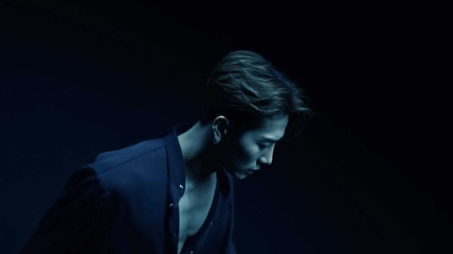 Jackson Wang In The Dark Background