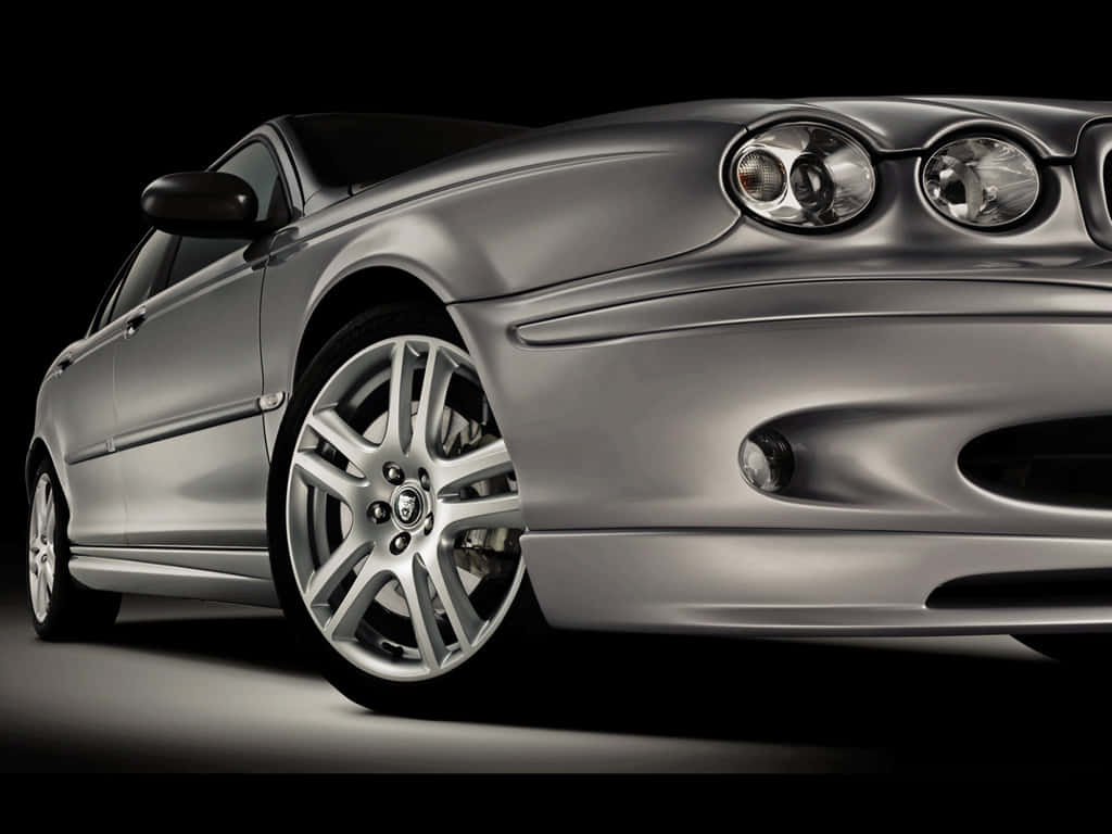 Jaguar X-Type: A Luxurious Blend of Performance&Elegance Wallpaper