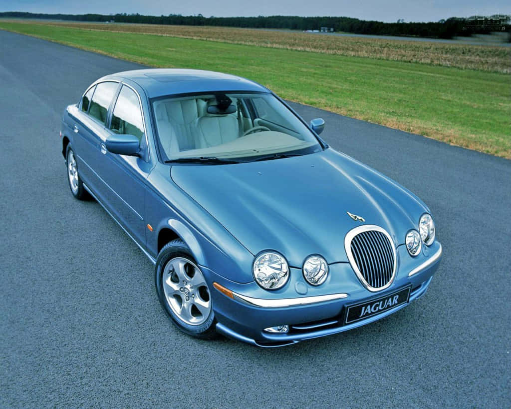 Captivating Jaguar X-Type in Action Wallpaper