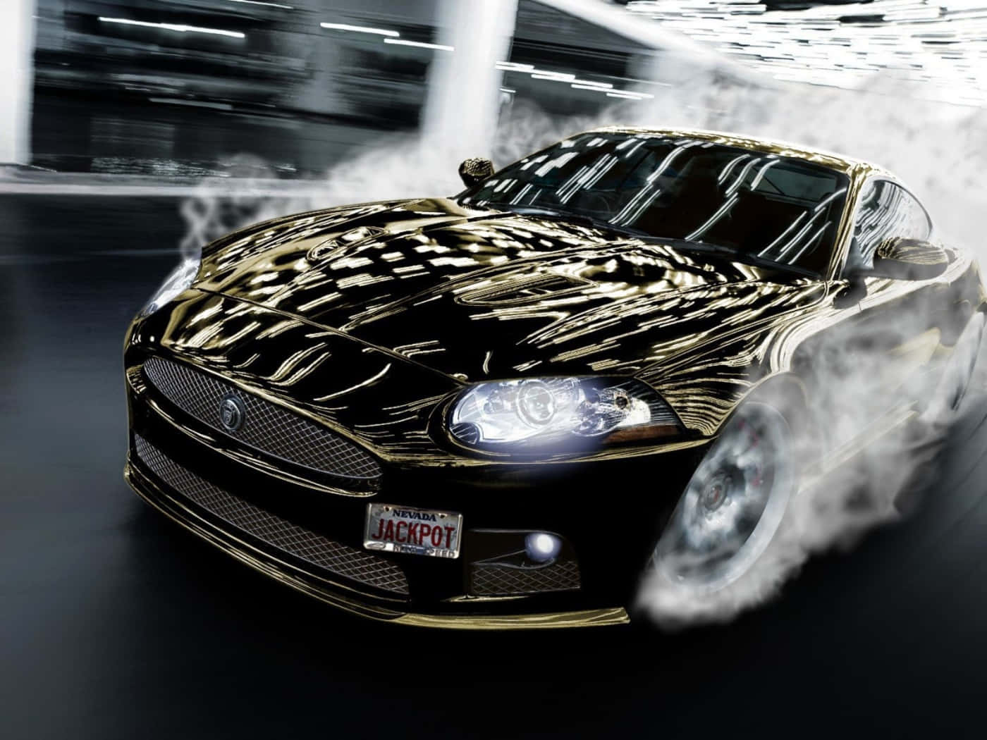 Sleek and Powerful Jaguar XKR in Action Wallpaper
