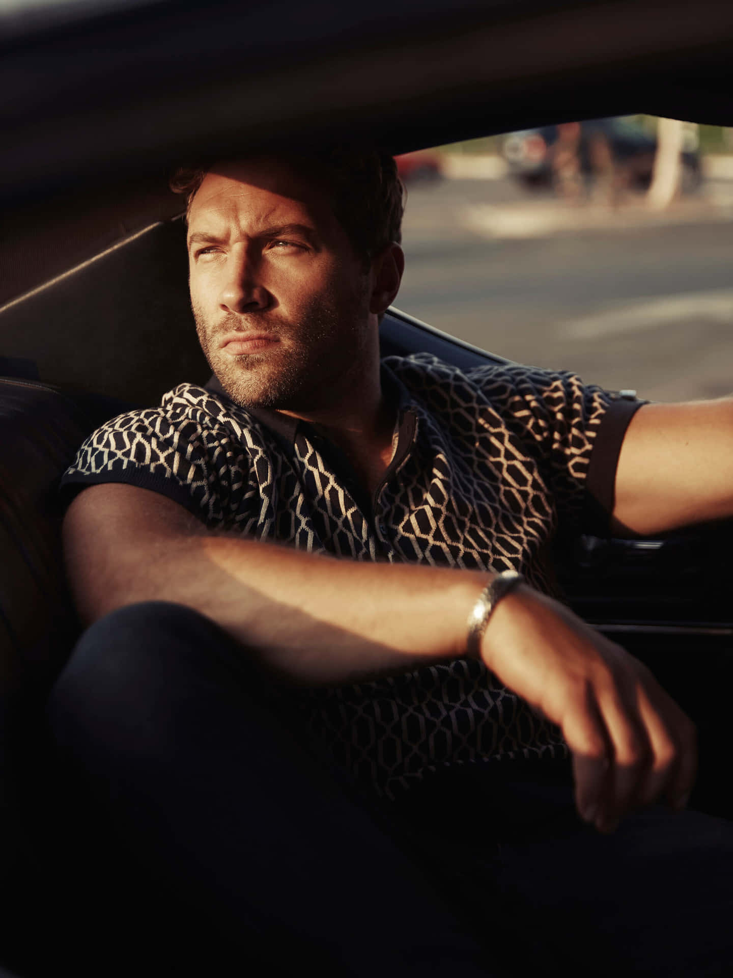 Jai Courtney Contemplative Car Ride Wallpaper