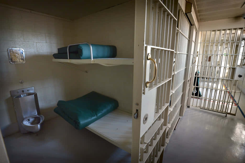 Inside a glum jail cell