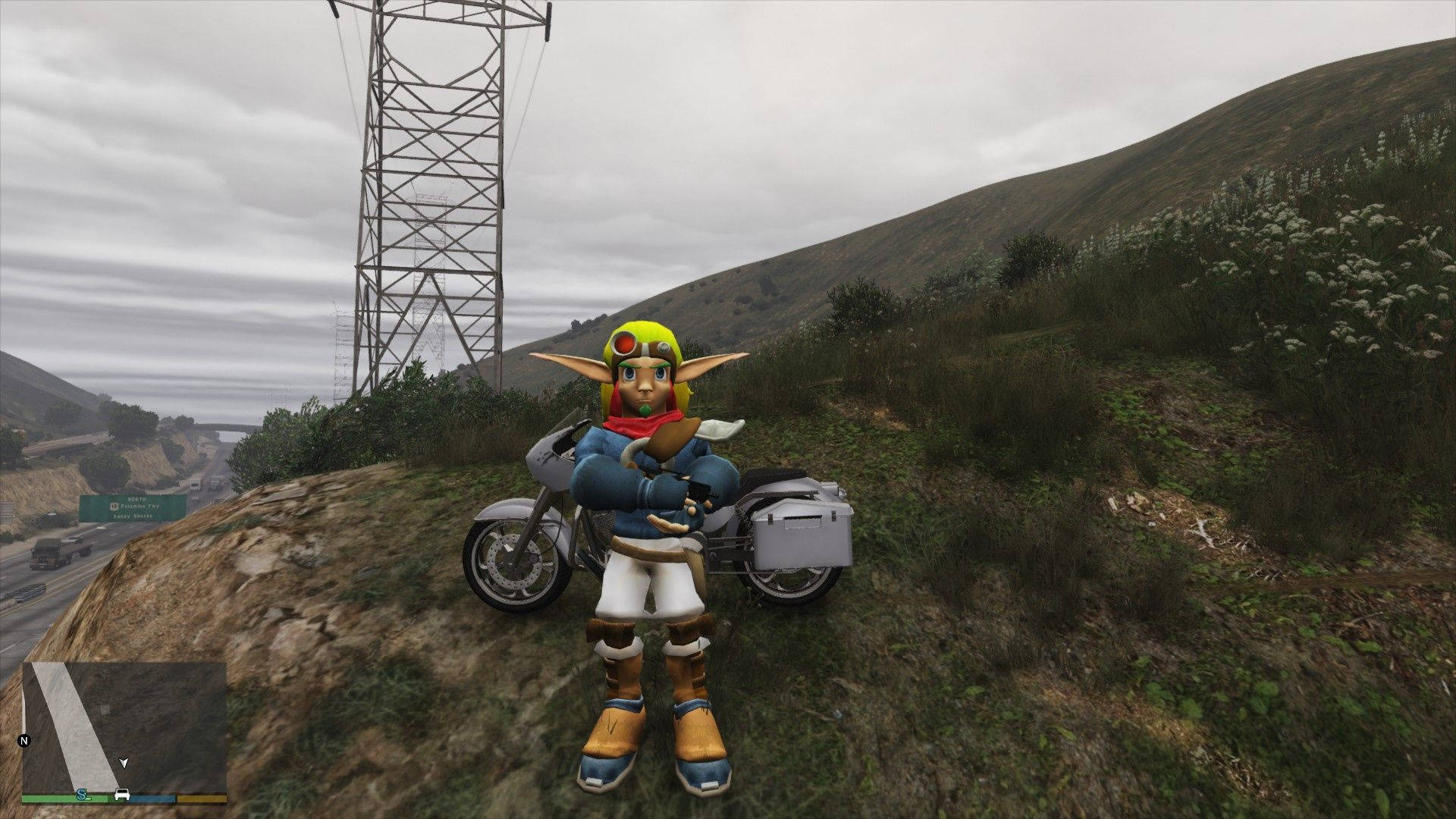 En karakter står på en bakke ved siden af en motorcykel. Wallpaper