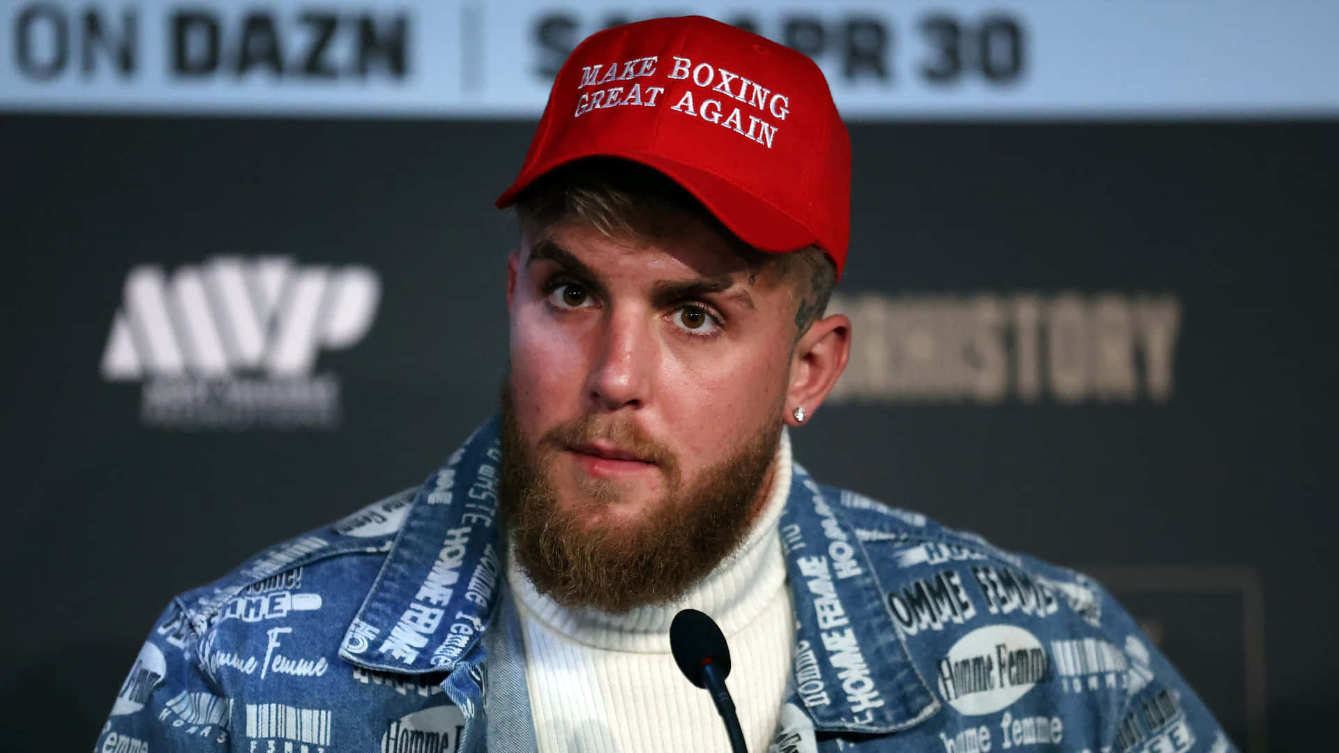 Jake Paul Red Cap Press Conference Wallpaper