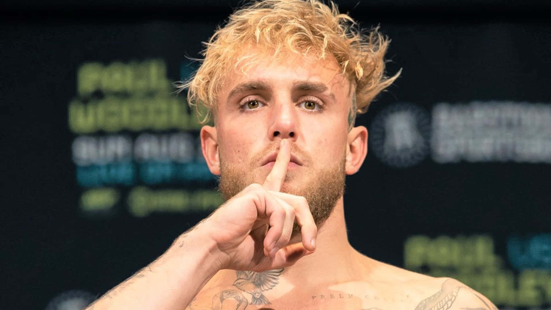 Jake Paul Silence Gesture Press Conference Wallpaper