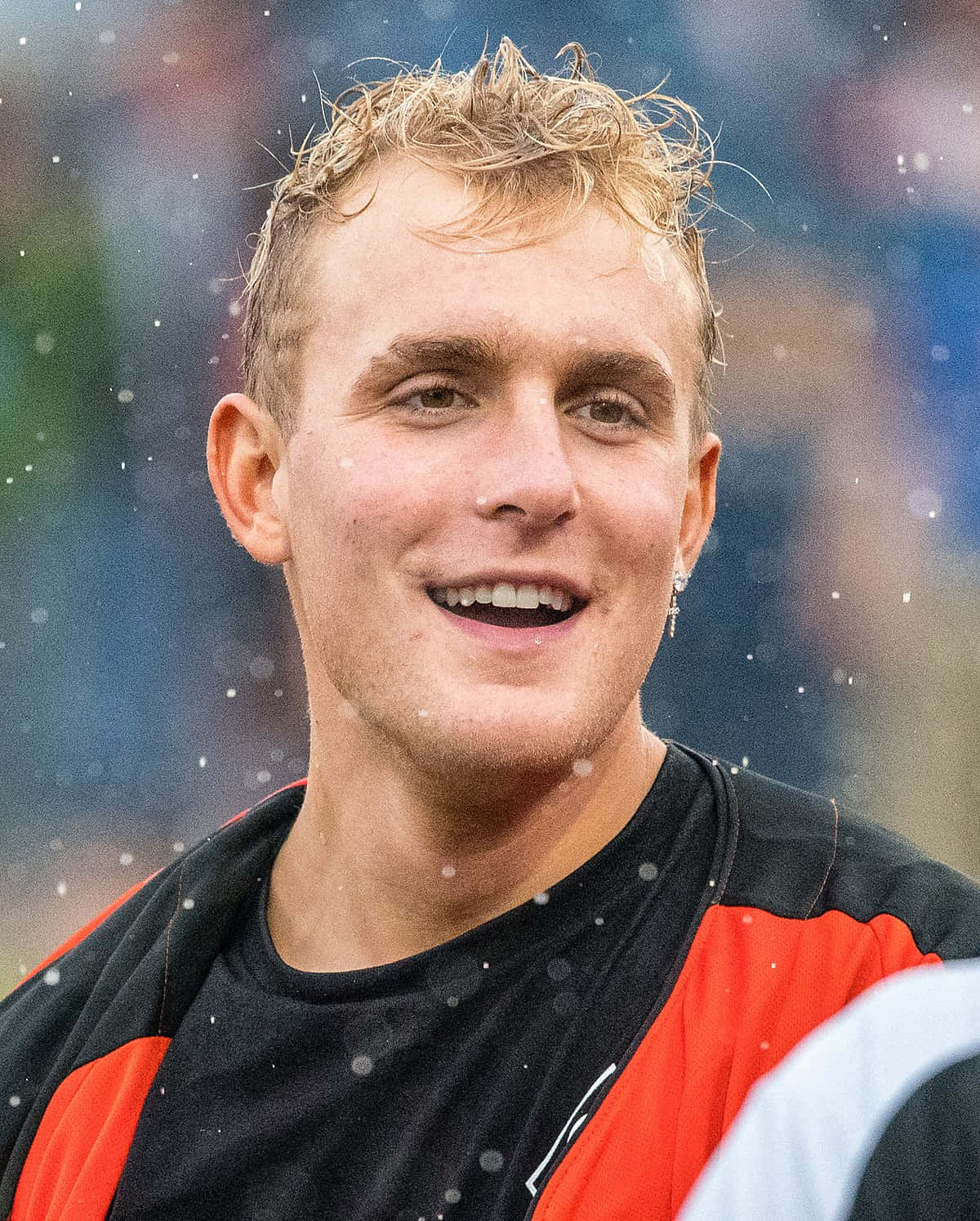 Jake Paul Smilingin Rain Wallpaper