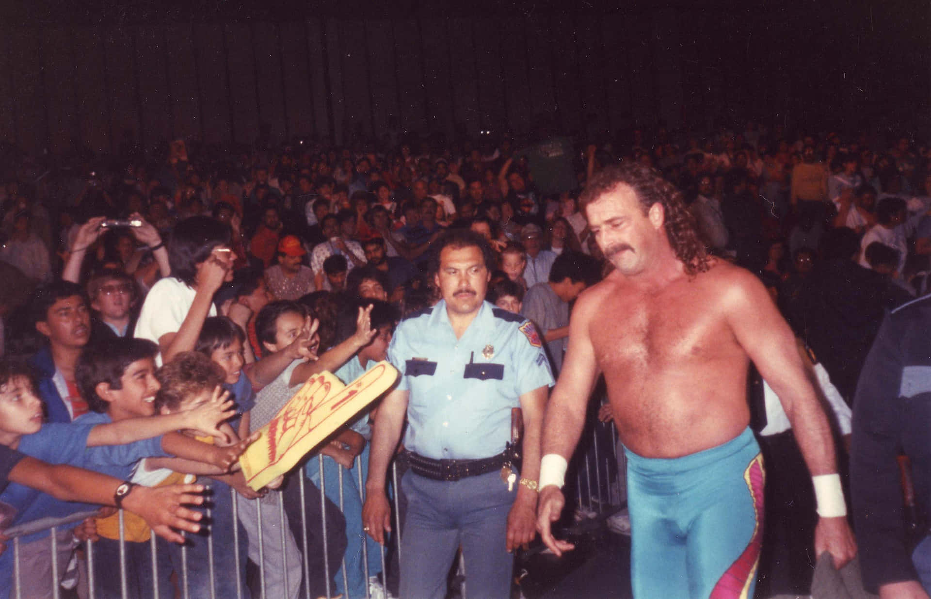 Jake Roberts Entering The Ring In The Late 1980s Wallpaper