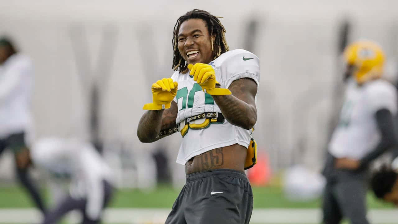 Jamaal Williams Smiling During Practice Wallpaper