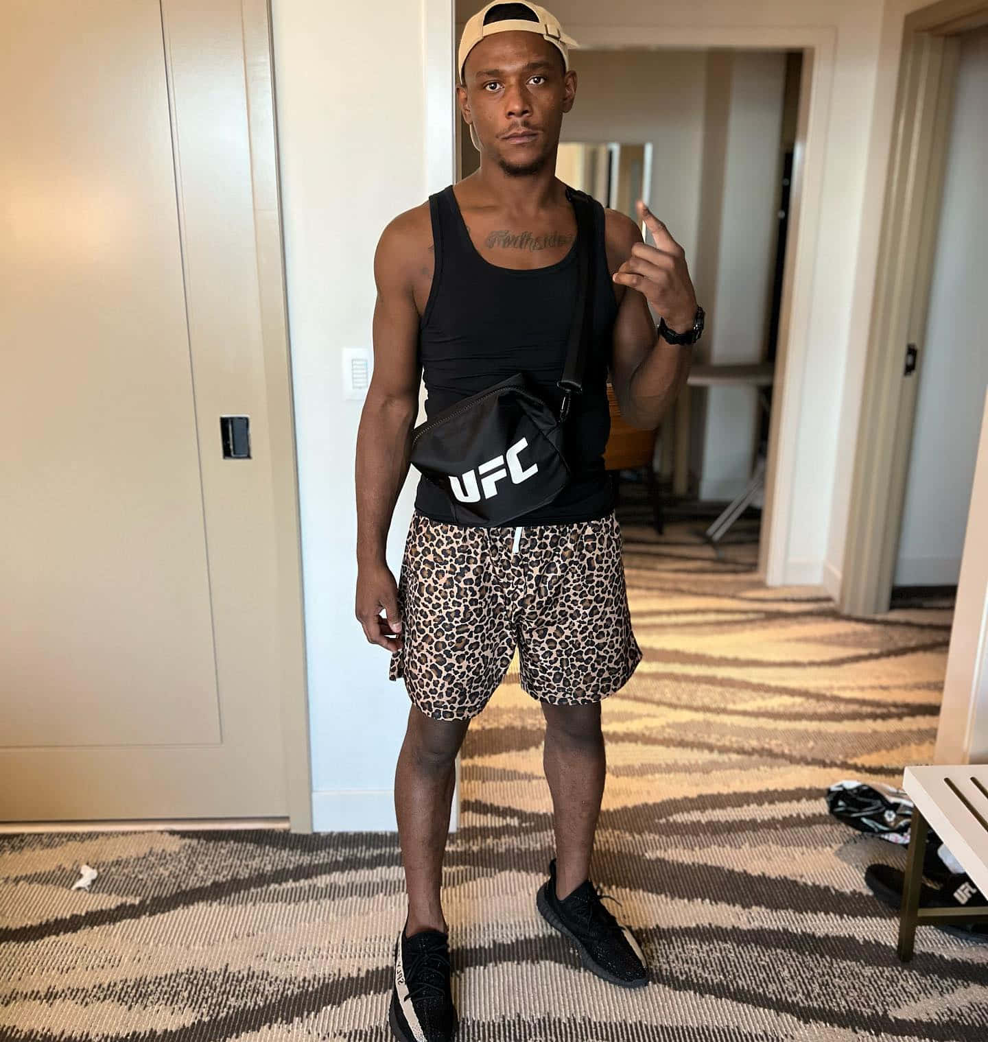 Jamahal Hill With Leopard-print Shorts Background