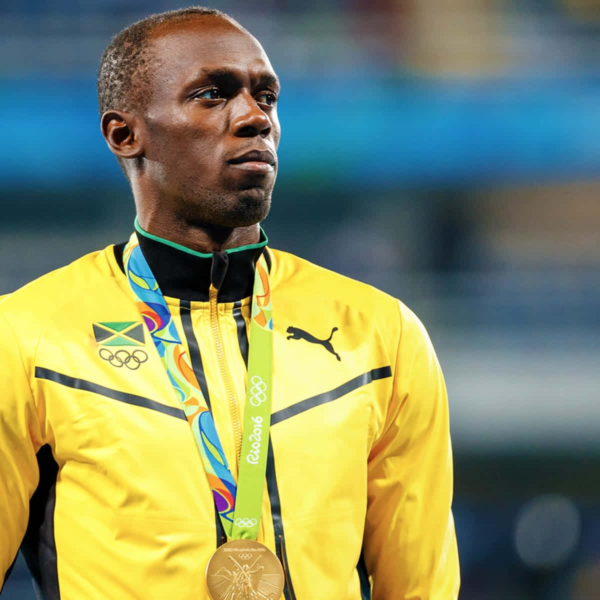 Jamaicanskaidrottaren Usain Bolt Ser Målmedveten Ut. Wallpaper