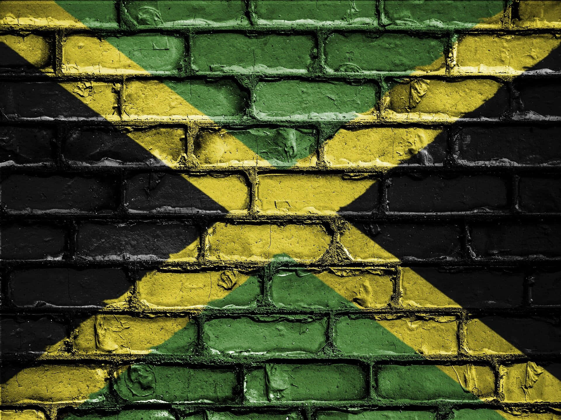 Jamaican Flag Painted Brick Wall Wallpaper