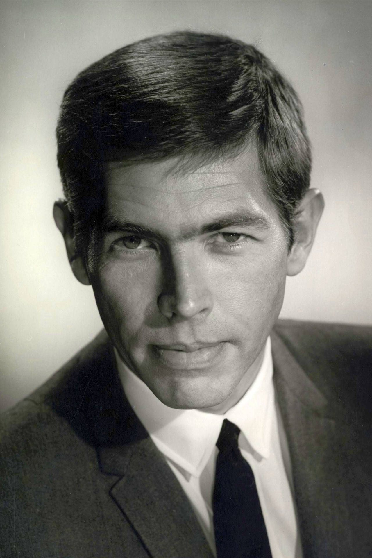 James Coburn In The Case Of The Envious Editor Wallpaper