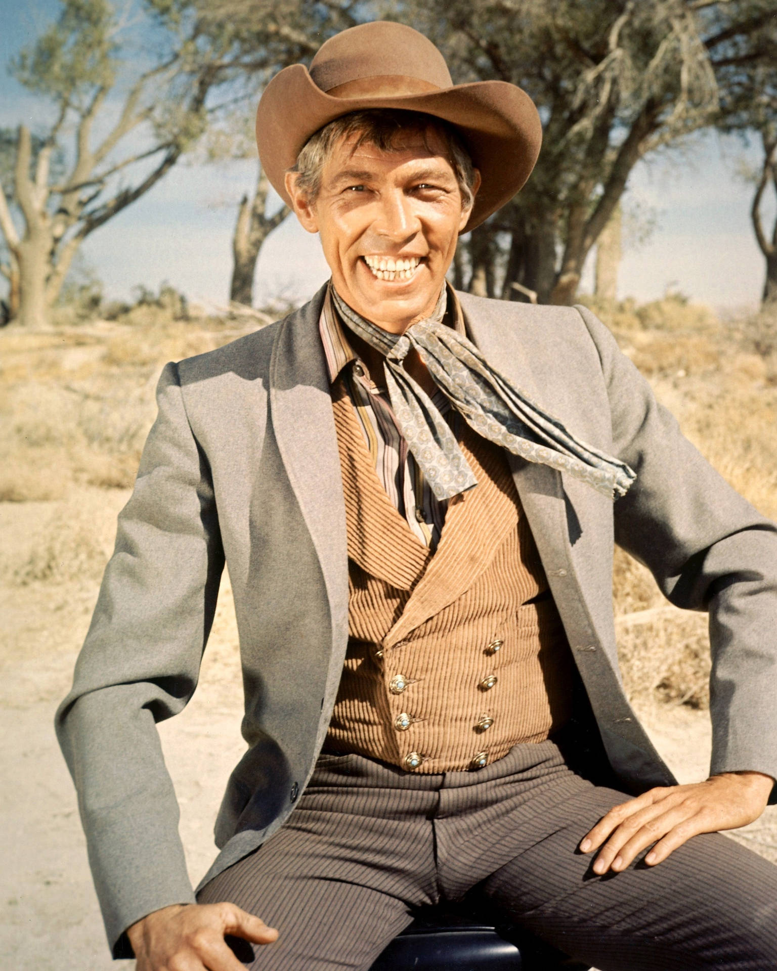James Coburn In Western Costume Wallpaper