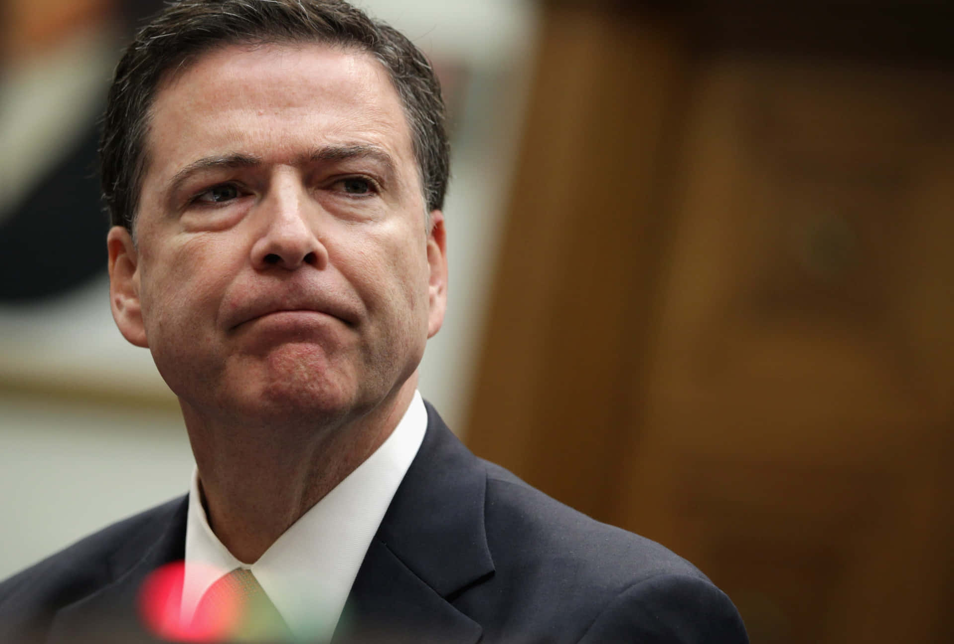 James Comey Serious Expression Wallpaper