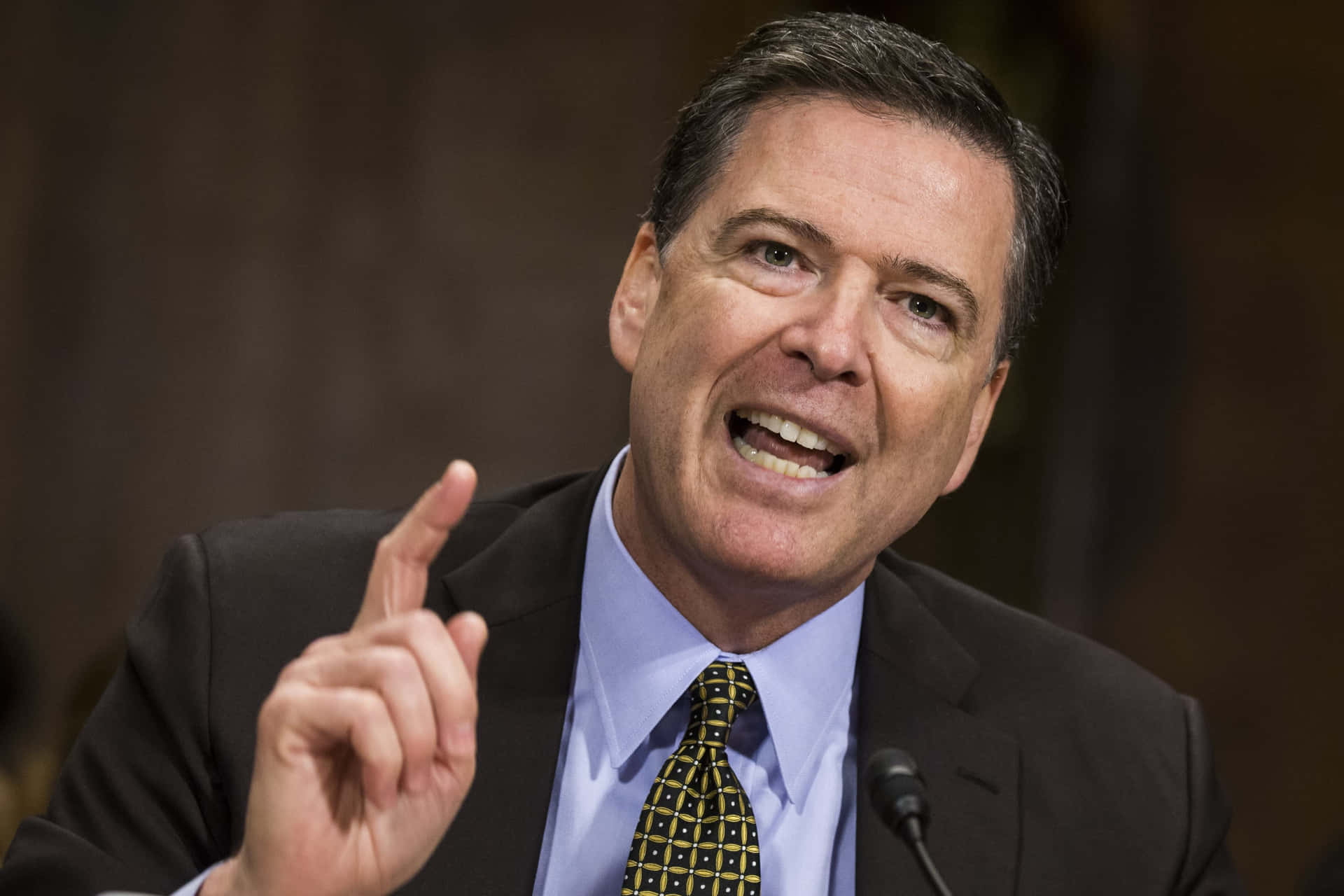 James Comey Speaking Gesture Wallpaper