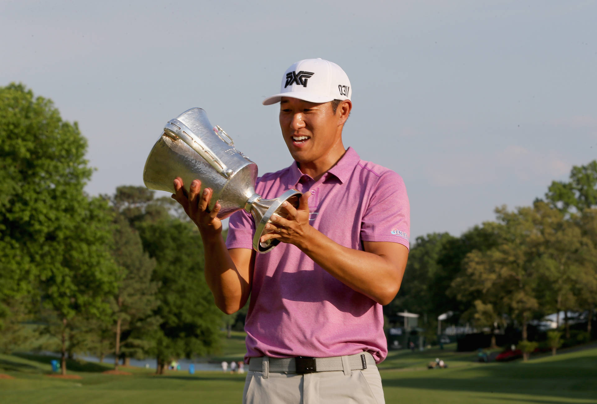 Victorious Moment: James Hahn Holding Trophy Wallpaper