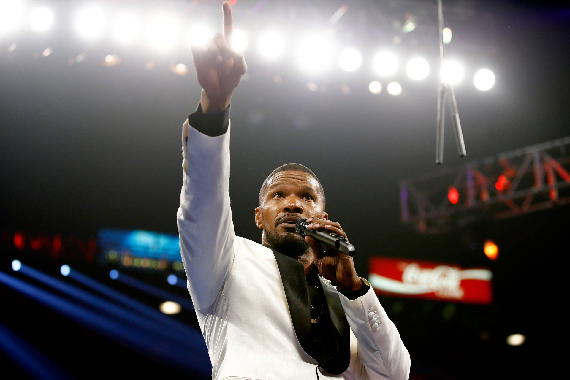 Actor Jamie Foxx smiles while attending the Mayweather vs Pacquiao boxing match Wallpaper