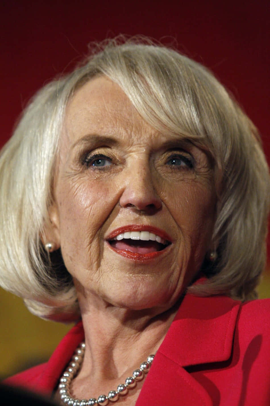 Jan Brewer Speaking At A Political Event Wallpaper