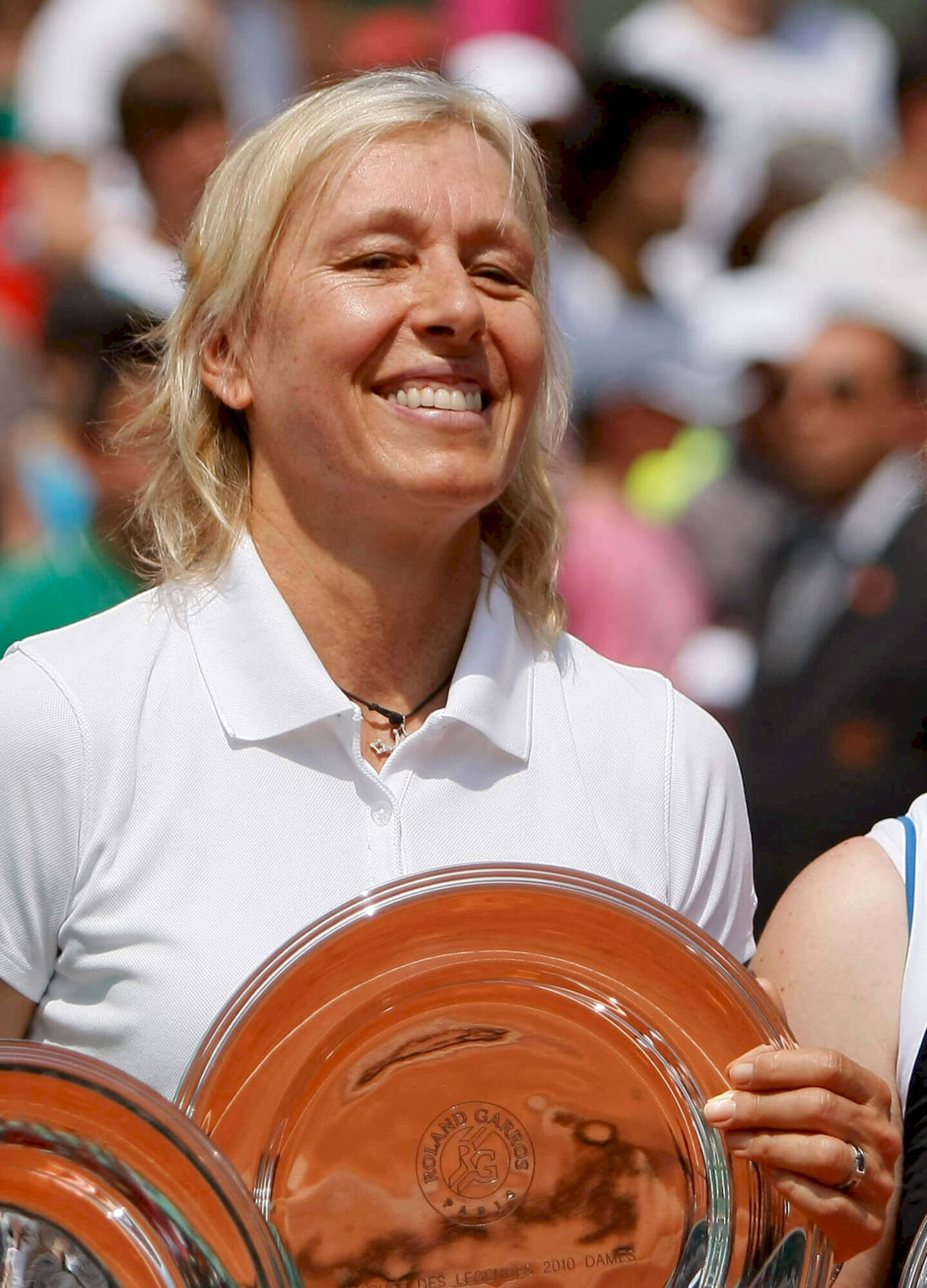 Jana Novotna Triumphantly Holding Tennis Trophy Wallpaper