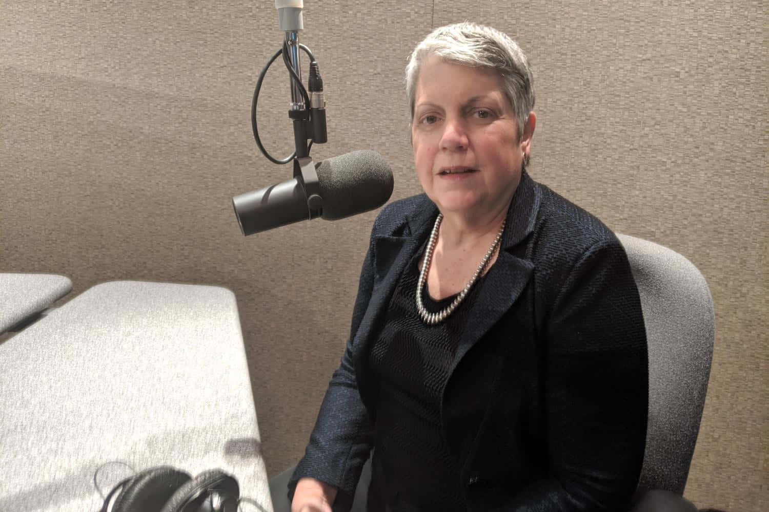 Janet Napolitano Microphone In Front Wallpaper