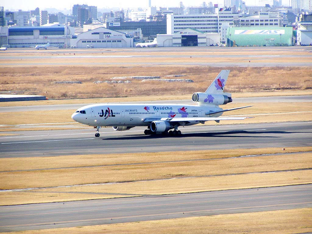 Japan Airlines Buildings Taxiing Picture