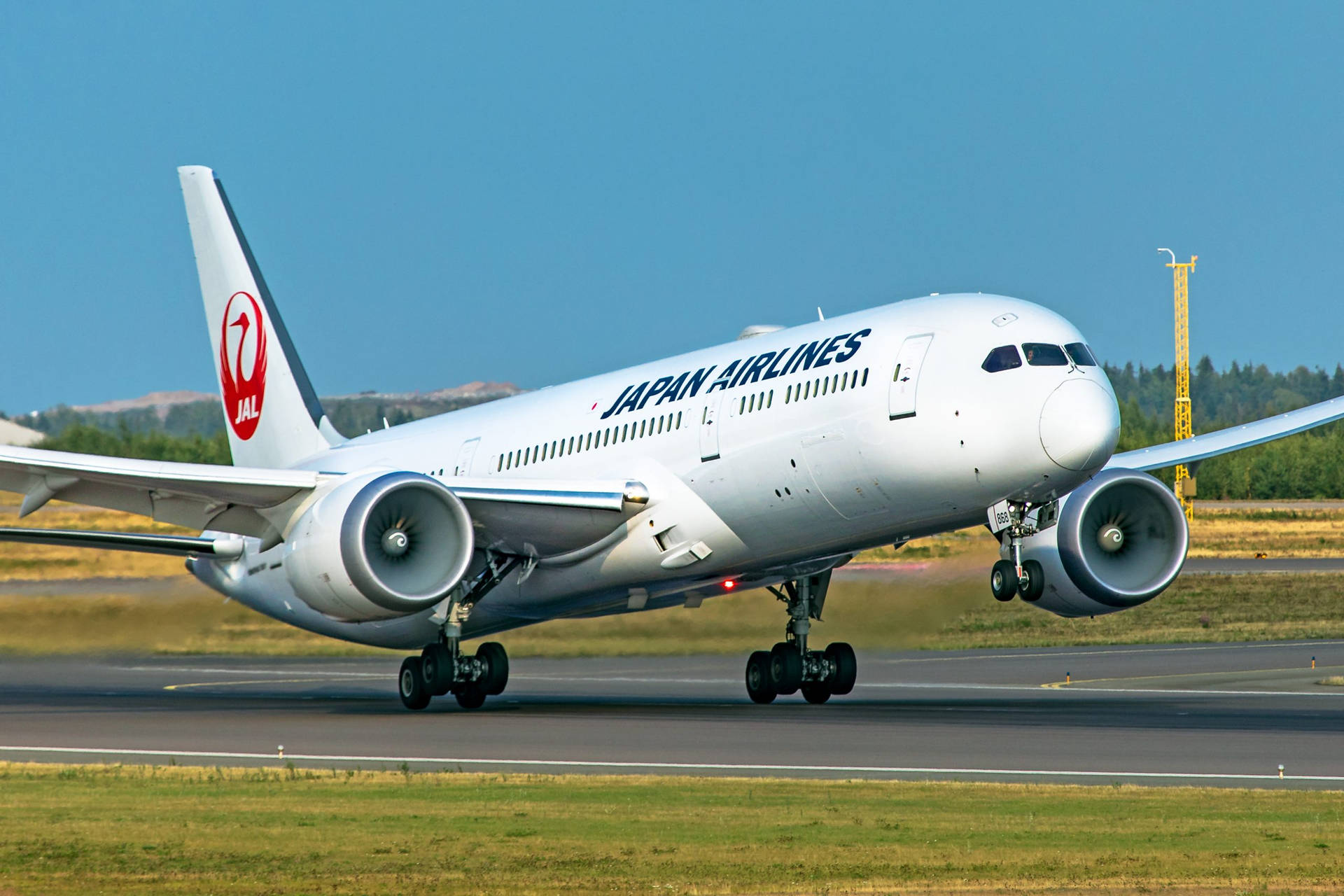 Japan Airlines forbereder Taxivej Wallpaper