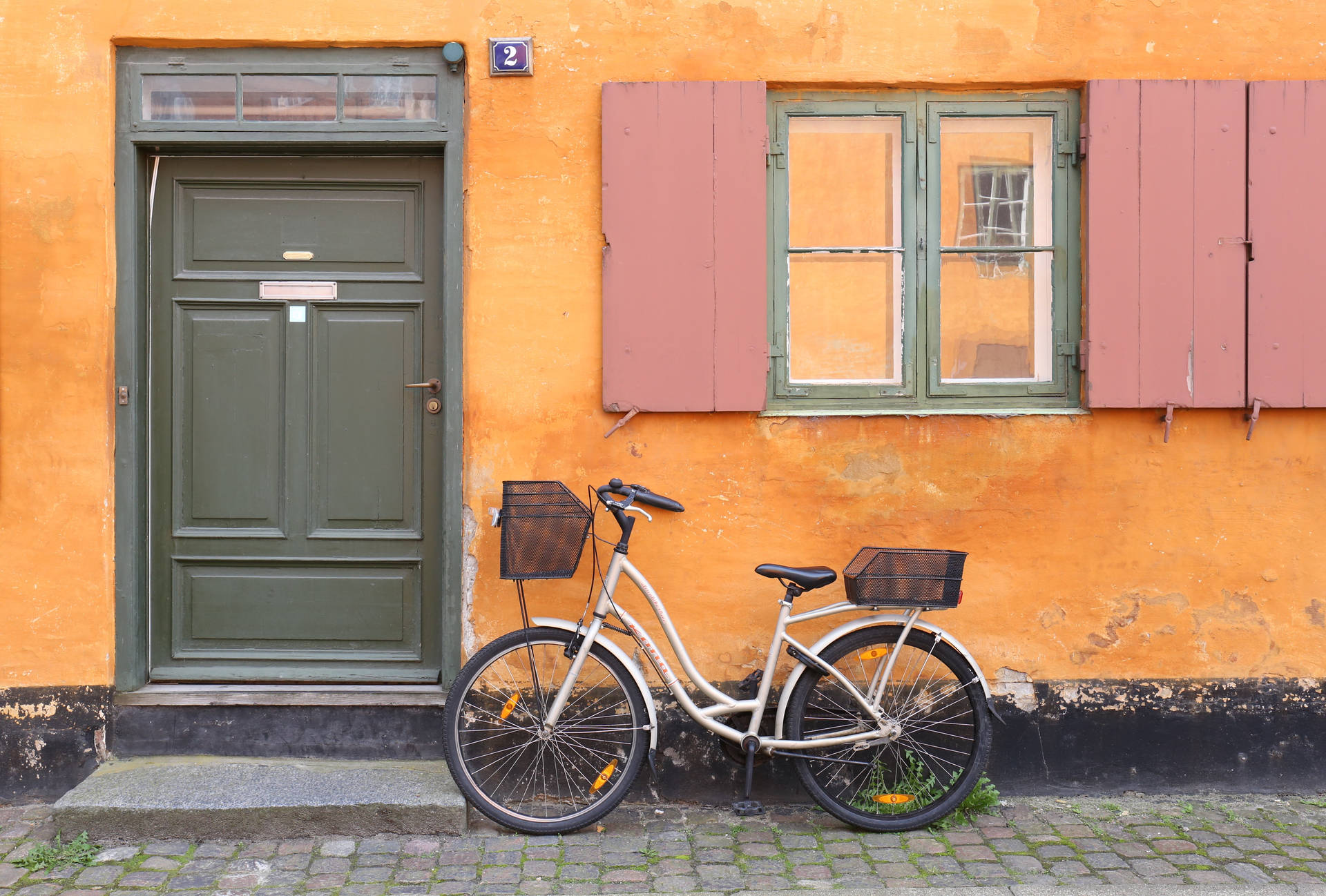 Japanese Bike In Orange Wall Background