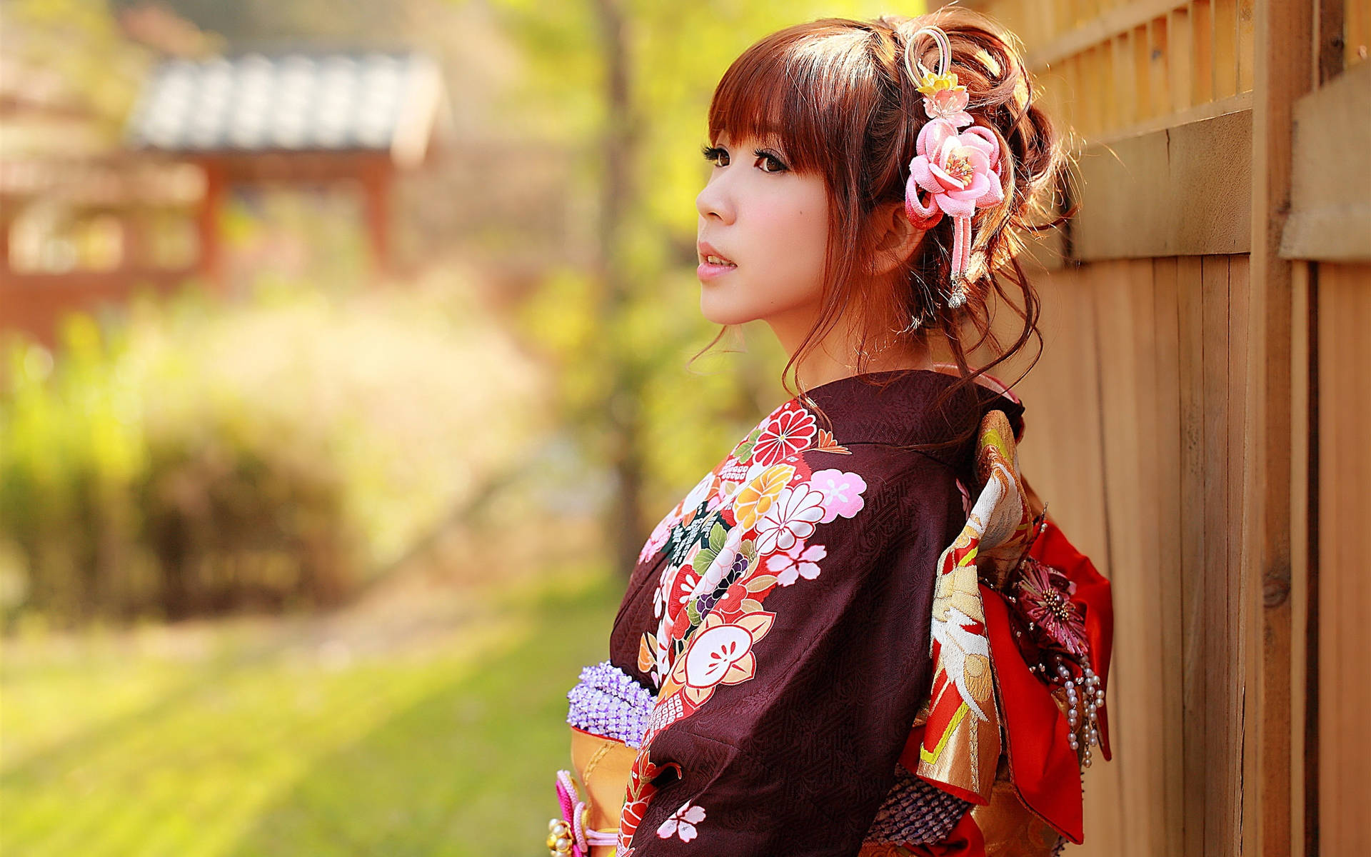 Japanese Girl By Wooden Fence Wallpaper