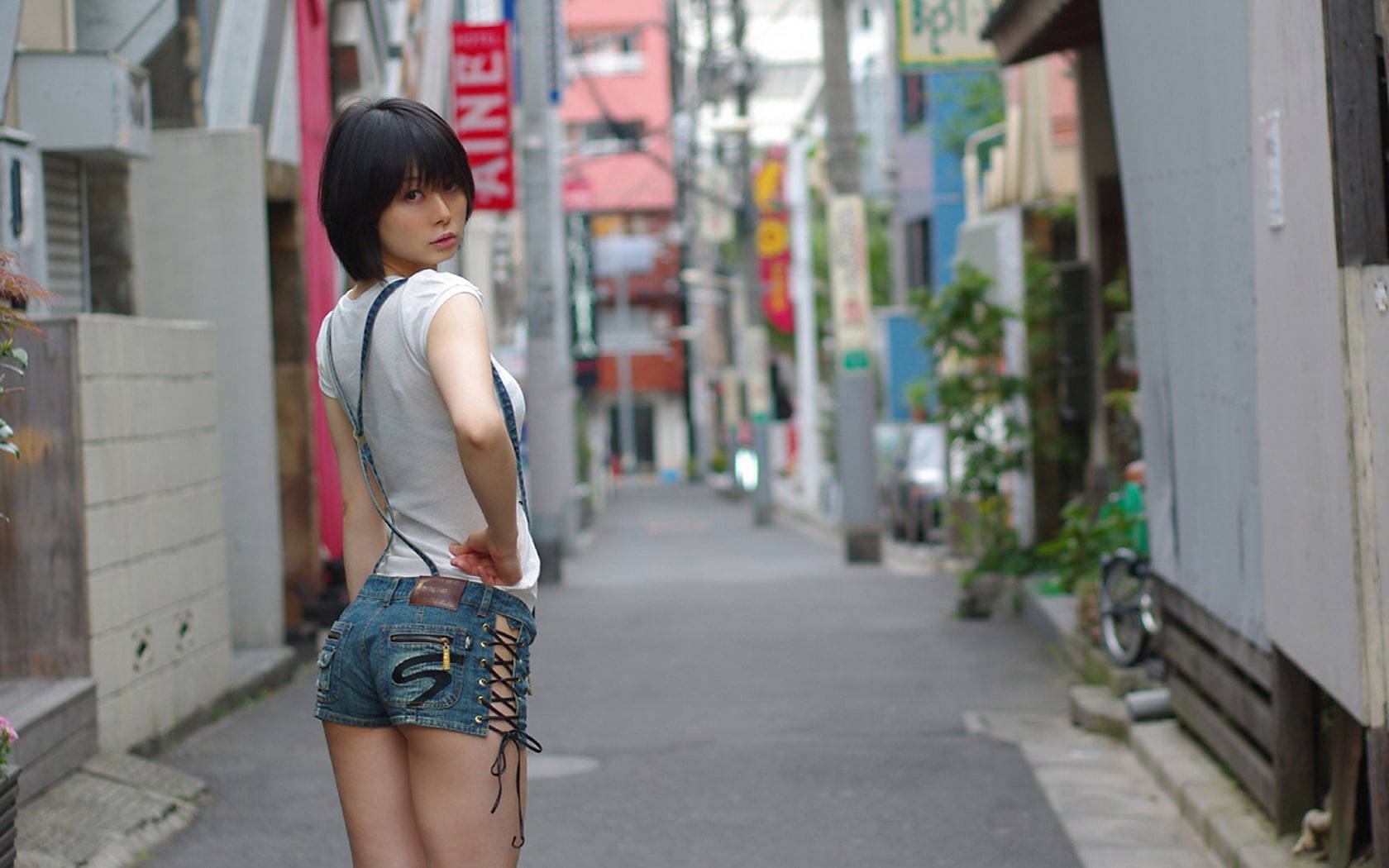 Japanese Girl On City Street Background