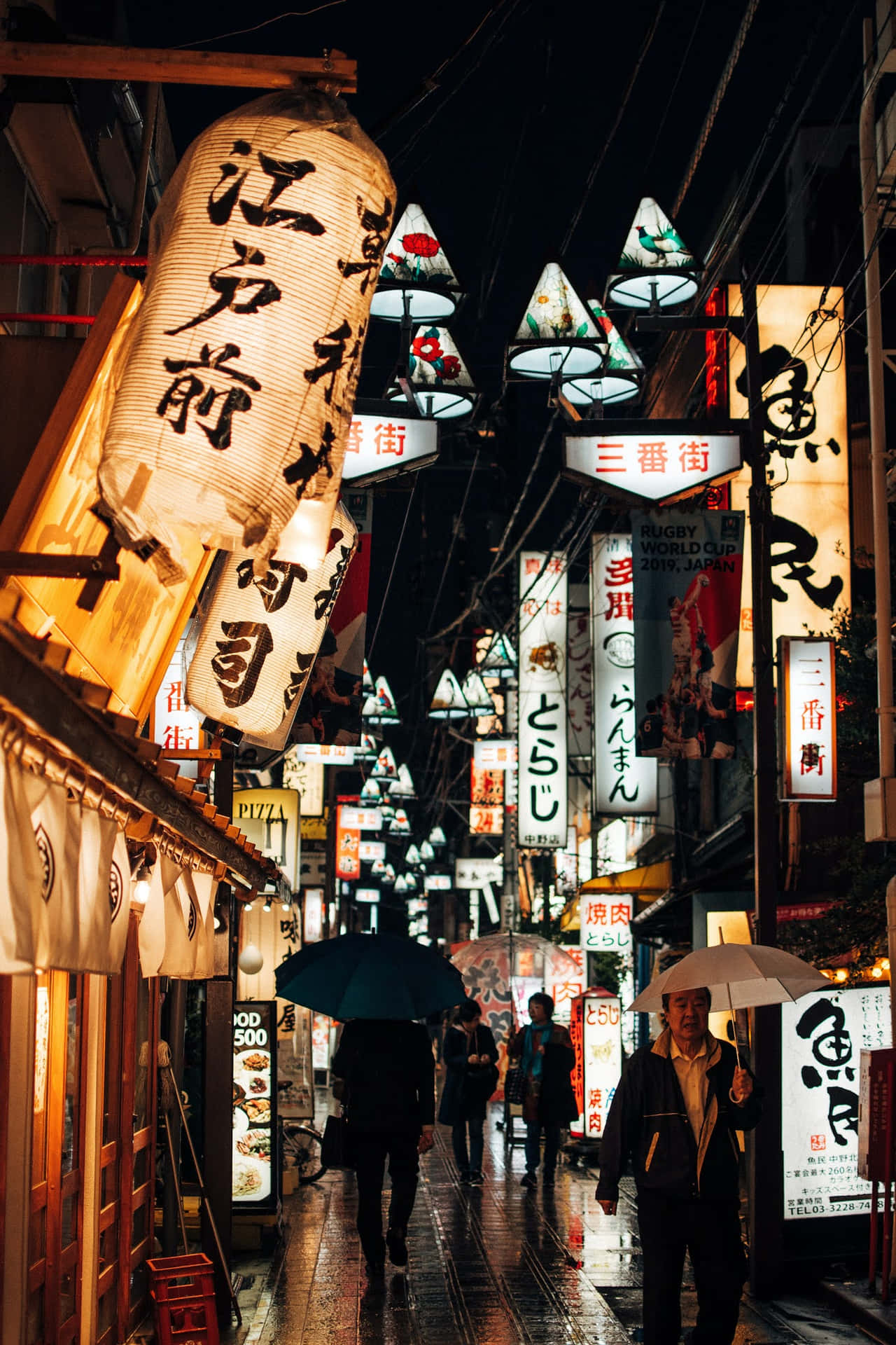 A Street With Many Signs Wallpaper