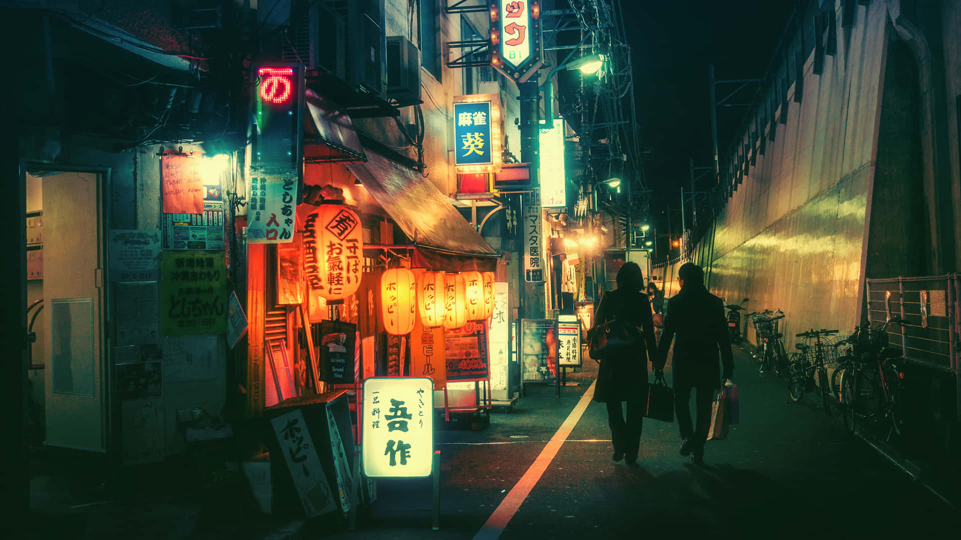 A Street With A Lot Of Neon Signs Wallpaper