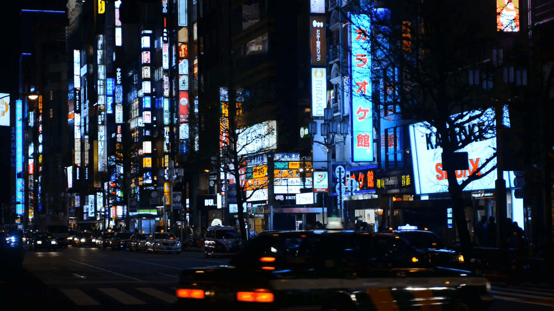 "Experience a night to remember in Japan's vibrant neon cities." Wallpaper