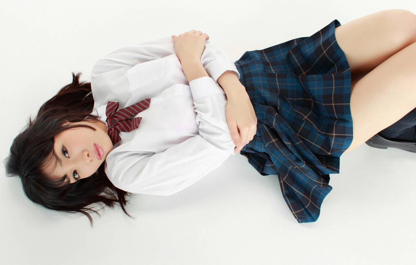 Japanese Schoolgirl Lying Down Wallpaper
