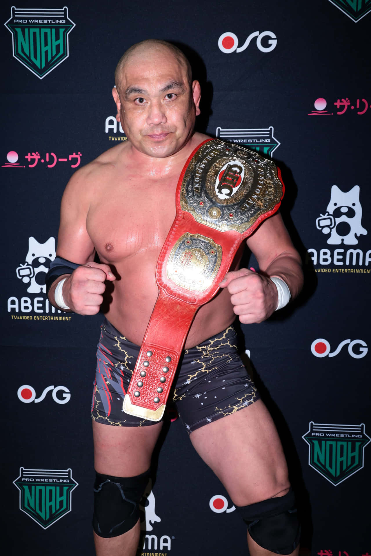 Japanese Wrestler Kazuyuki Fujita With Championship Belt Photograph Wallpaper