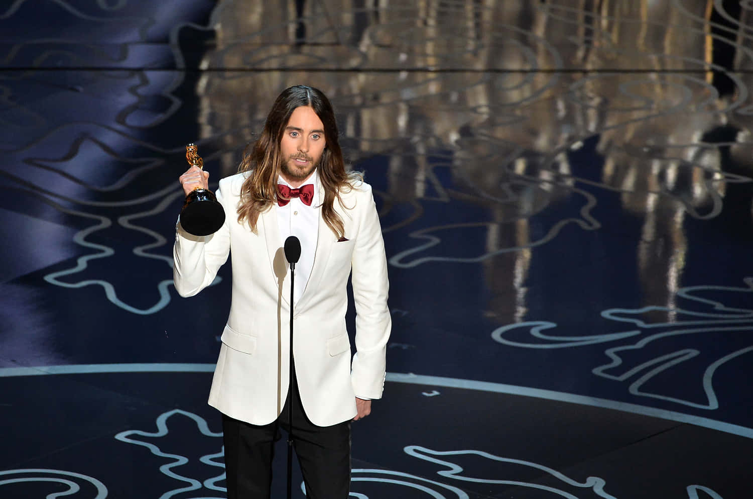 Jared Leto stirring the audience with his intense gaze Wallpaper