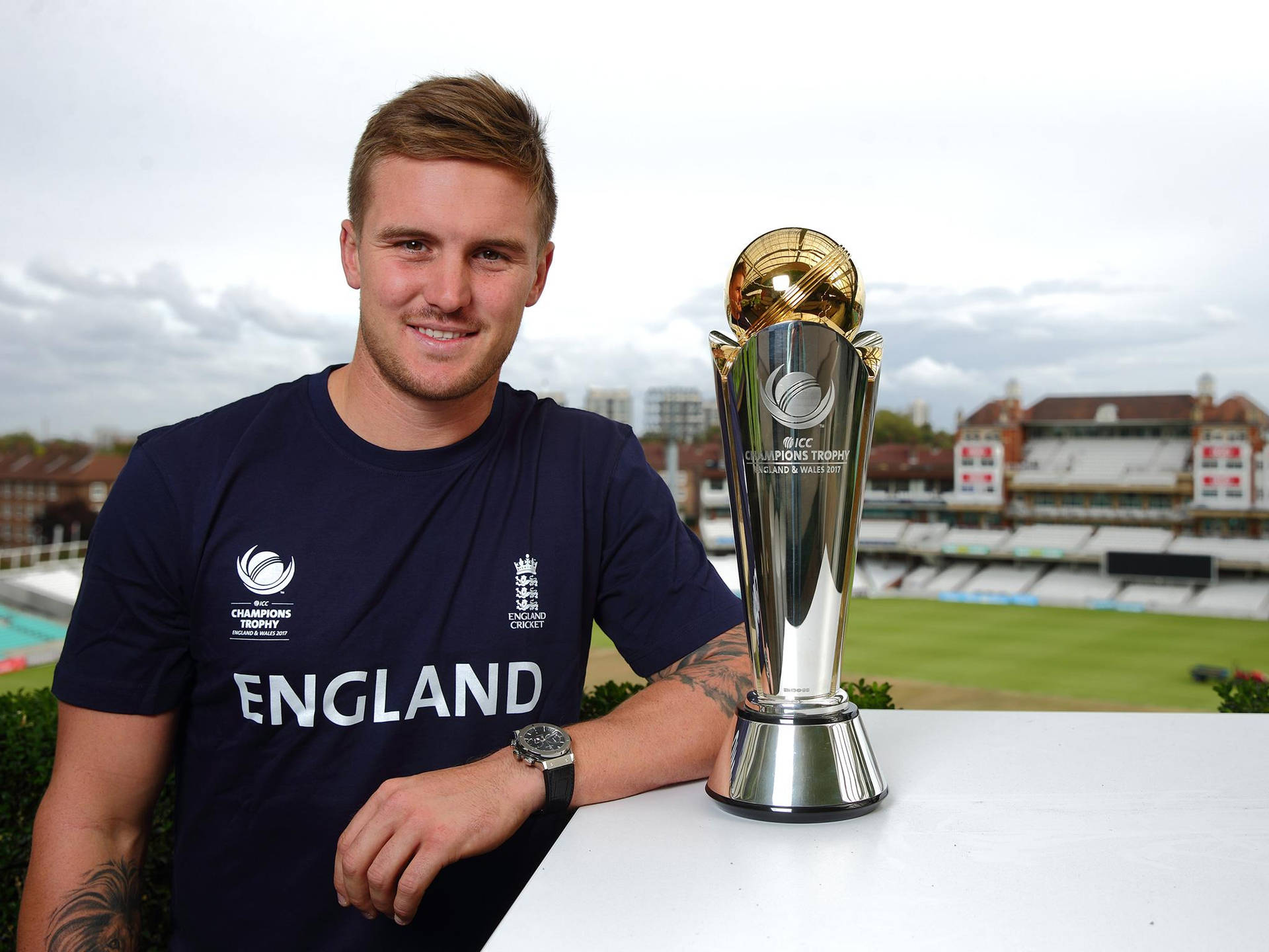 Jason Roy With Championship Trophy Wallpaper