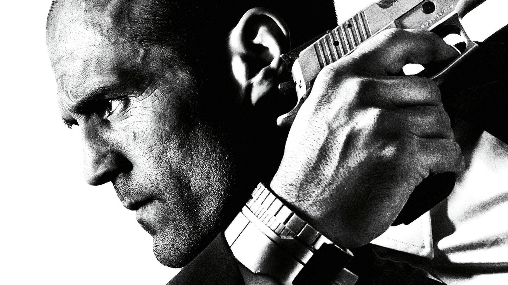 Jason Statham With Gun Monochrome Background
