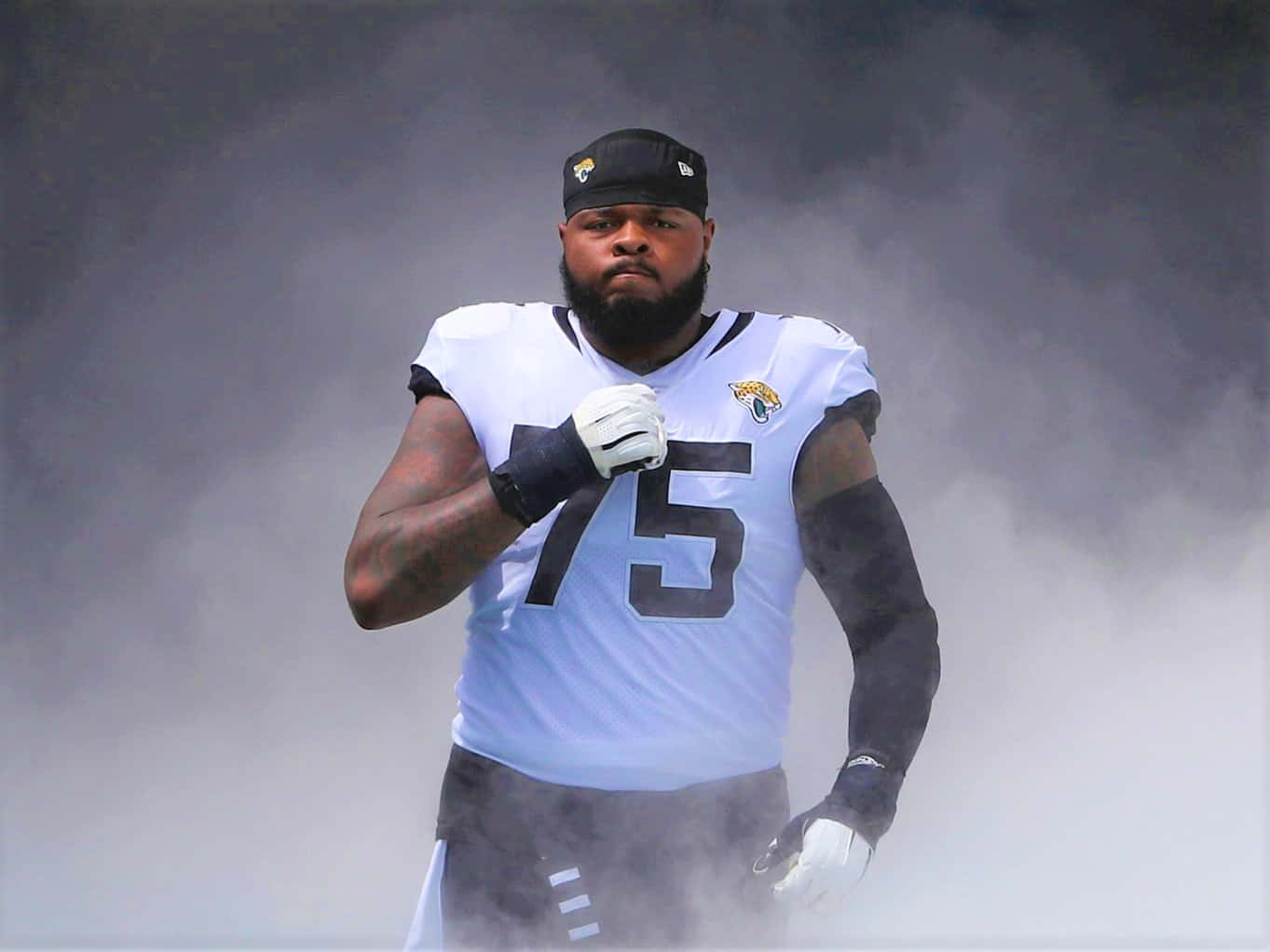 Jawaan Taylor En Action Lors D'un Match De Football Fond d'écran